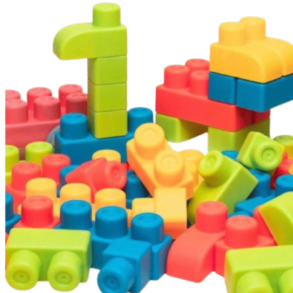 Blocs de construction souples en silicone de couleurs pastel, adaptés aux bébés selon la méthode Montessori, favorisant la motricité et l’exploration sensorielle.