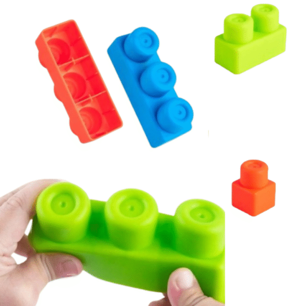 Blocs de construction souples en silicone de couleurs pastel, adaptés aux bébés selon la méthode Montessori, favorisant la motricité et l’exploration sensorielle.
